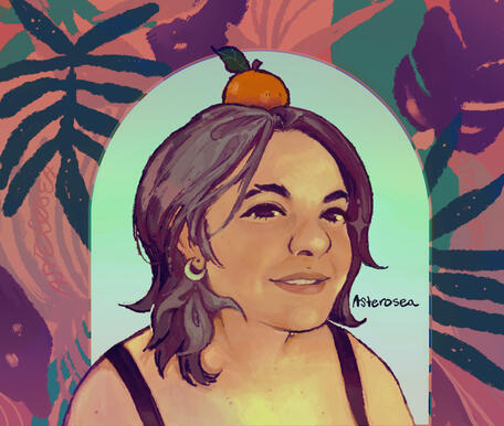 Orange on my Head: A Portrait. A portrait of a person smiling. They are wearing a crescent moon shaped earring and have an orange on their head.